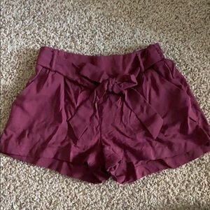 Maroon tie waist shorts.